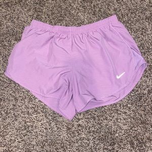 Used women’s Nike shorts with liner and zipper.